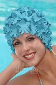 What was the style of swim caps in the early 70's?