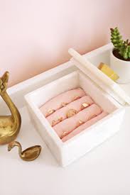 There are many things at home that can be put to a second best use of the jewelry boxes like mod podge, tiffin boxes, old books and the shoe boxes. Make Any Box Into A Jewelry Box A Beautiful Mess