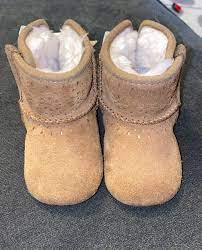 baby uggs size 2 3 worn but still in good condition slight wearing at toes see pics bows in back velcro sides no box baby uggs uggs ugg boots
