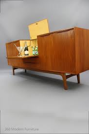 This buffet has been newly stained in a rich ebonized color with gi. Mid Century Modern Buffet Bar Novocom Top
