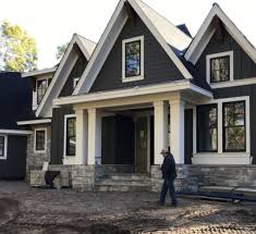 Door (most let's look at how changing these basic color schemes can dramatically change a home's style. Dark Blue House With White Trim Black Windows House Exterior Blue Gray House Exterior Grey Exterior House Colors