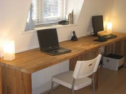 showing photos of long computer desks