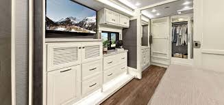 This new travel trailer boasts tons of storage throughout with sleek finishes! Rv With White Interiors No Painting Required
