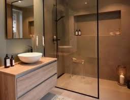 Today you'll see how we install glass shower panels on top of that knee wall. Shower Screens En Suites