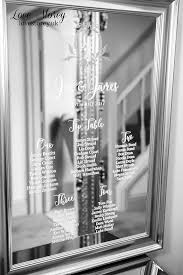 mirror wedding table plan with modern calligraphy fonts