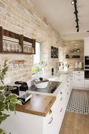 Countryside kitchen with pitched ceiling and brick backsplash. 100 Brick Kitchens Ideas In 2020 Kitchen Design Brick Kitchen Kitchen Inspirations
