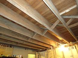 Hiding all those systems with a finish material will give your basement instant credibility as usable. 79 Basement Ceiling Ideas Basement Ceiling Low Ceiling Basement Remodeling