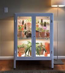 Diy indoor greenhouse under $5 from instructables. Ikea Fabrikor Cabinet Greenhouse Diy Hunker