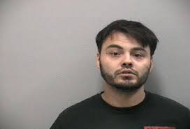 Man accused of aggravated battery after putting knife up to man's throat