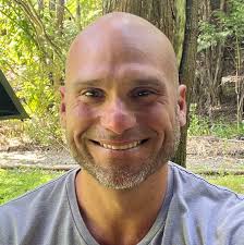 How to get Thai Baht and a taxi to Samsen Road from Bangkok airport?