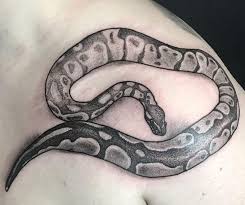 Some kalinga tattoo meanings are more modern such as symbols for a traveler, compass, prayer, and even the arrow. 33 Coolest Python Tattoo Designs Python Tattoo Tattoo Designs Snake Tattoo
