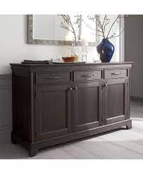 A buffet sideboard typically has short legs, with cabinets that extend to the floor. Barlow Short Clear Glass Pillar Candle Holder Sideboard Decor Dining Room Dining Room Buffet Table Dining Room Buffet