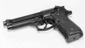 Your middle, ring, and pinky fingers should wrap around the outside and front of the grip. M9 9 Mm Beretta Pistol