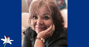 Elizabeth Pena "Lisa" Moore, age 60