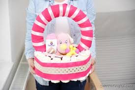 Not only will it add a decorative element to the nursery, it also makes a fun toy. Cute Pink Diy Diaper Basket Baby Shower Gift Diy Crafts