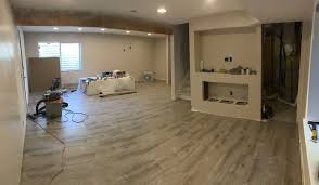 Installing bathroom flooring is straightforward, only complicated by the number of items that need to be cut around. Lifeproof Sterling Oak Farmhouse Flooring House Flooring Home Remodeling