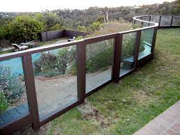 The wood deck cantilevers over a limestone bluff and overlooks ranger creek below and a private nature preserve beyond. See Through Fencing Modern Fencing And Gates Houzz