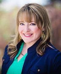 Sara K. Downs, AuD￼