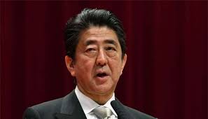 Japan PM Abe keeps allies in key posts, just one woman in cabinet
