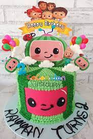 Pink, yellow, teal buttercream flower birthday cake with painted buttercream leaves. Just Lildaisy Ampang Cocomelon Cake