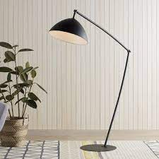 This lamp shade offers the circle pattern and the contrasting yellow finish to catch everyone's eye easily. 14 Best Midcentury Floor Lamps To Light Up Any Room