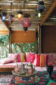 Boho chic style with use of the 1970s decor, mix & match funky fabrics and colorful cylinder style shade inlaid with faux cut crystals and hanging faux jewel baubles. Bohemian Interior Design Trend And Ideas Boho Chic Home Decor