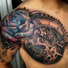 G E T I N K E D Cool Chest Tattoos Mens Shoulder Tattoo Rose Tattoos For Men