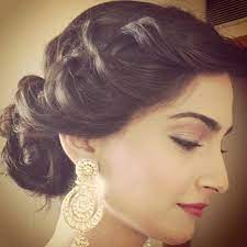 Here is a beautiful twisted high hair bun for a gown that is simple to do. 25 Inspiration Side Bun Hairstyle For Gown