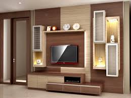 Selain menggunakan meja tv hanya untuk tv, kamu bisa memanfaatkan space yang kosong di ukuran meja yang sedikit tinggi membuat meja tv minimalis plus rak buku ini memiliki tambahan. Menciptakan Suasana Hangat Dan Akrab Dalam Desain Ruang Nonton Tv