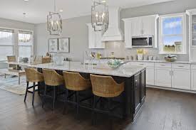 Drees Homes Winfield Kitchen With White Cabinets Hardwood Floors Breakfast Island And Pendent Lighting Log Home Kitchens Home Kitchens Kitchen Remodel
