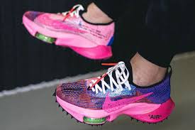 Find it online or in store. First Look At Pink Off White X Nike Air Zoom Tempo Next