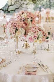 Blue and pink can be a lovely colour combination to use at your wedding. 20 Stylish Soft Pink And Blush Wedding Ideas Modwedding Dusty Rose Wedding Colors White Wedding Centerpieces Wedding Centerpieces