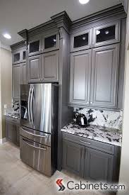 Love How They Put Glass Inserts In Their Upper Cabinets Topped With Crown Molding And Corbels White Granite Countertops Kitchen Dinning Room Dark Grey Kitchen
