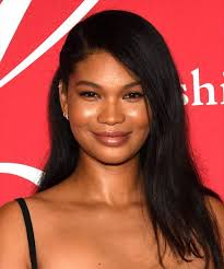 Chanel Iman Long Straight Black Hairstyle with Side Swept Bangs