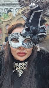 Hello, I have lost today a big white envelope that has two paintings that  we bought today from street of Venice. We stupidly forgot it