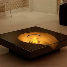 That's right, you can watch tv while stretched out on your steel drum sofa with a flame burning right in front of you. 40 Creative Coffee Tables Cuded Coffee Table Design Modern Coffee Table Fireplace Coffee Table Design