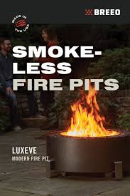 The materials to build this smokeless fire pit can be found at any hardware store, and cost a fraction of what the more competitive stainless steel fire pits cost. Smokeless Fire Pits Fire Pit Backyard Patio Designs Cool Fire Pits