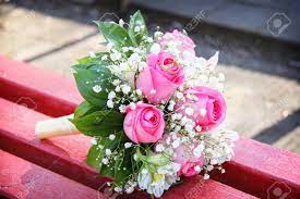 All varieties have been preserved to ensure many. Wedding Rings On A Wedding Bouquet Of Pink Roses And White Small Stock Photo Picture And Royalty Free Image Image 116806574