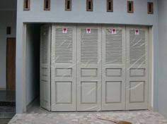 Powder coating tahan karat, modern, ekonomis, artistik. 16 Model Desain Pintu Garasi Modern Ideas Garage Doors Doors Garage Door Decor