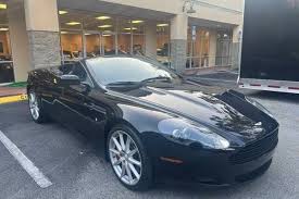 Image result for Jet Black 2011 Aston Martin