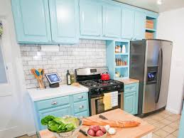 They covered the cabinets, metal strap hinges included, with a benjamin moore color match of farrow & ball lamp room gray, a soft gray. Repainting Kitchen Cabinets Pictures Options Tips Ideas Hgtv