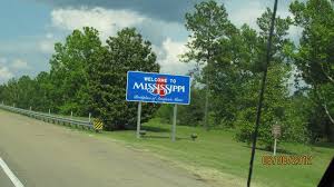 Man people posture body language. Mississippi Welcome Sign Photo