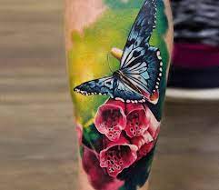 If you want a custom tattoo design mail me to: Butterfly On Flower Tattoo By Andrey Stepanov Post 27947