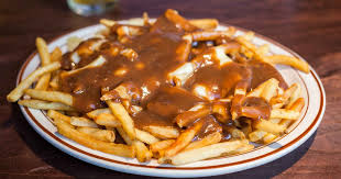 The dish gives diners a delicious sample of traditional poutine with warm gravy, soft cheese curds and crispy fries. Poutine Your Mouth Menu Oddfellas Pub Eatery Tacoma European Style Pub In Tacoma Wa