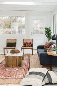 Modern Boho Living Room With Persian Rug And Leather Woven Chairs Livingroom Modern Boho Living Room Mid Century Modern Living Room Decor Rugs In Living Room