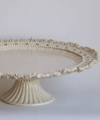 For formal dinners and holiday gatherings, arrange homemade confections on a glass stand as a centerpiece for the dining room table. Because I Love Frances Palmer S Work Large Ruffle Cake Stand Handmade Taartstandaard Keramiek Porselein