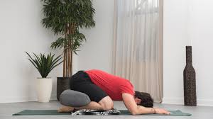 Using both hands, pull up one knee and press it to your chest (b). Yoga For Men A Floor Sequence To Relieve Moderate Low Back Pain