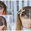 Just spray a texture spray or dry shampoo from the middle of your hair shaft to the roots, then secure clear elastics along your low ponytail, pulling each section apart to create a bubble effect. 3