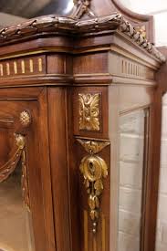 A fine quality 19th century french louis xvi style satinwood marquetry inlaid secretaire cabinet, with wonderful inlaid. Louis Xvi Display Cabinet In Walnut With Gilt Accents Slideshow Houtroos