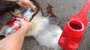 How To Remove Oil Stain From Driveway In 60 Seconds Using Cola Remove Oil Stains Cleaning Hacks Oil Stains